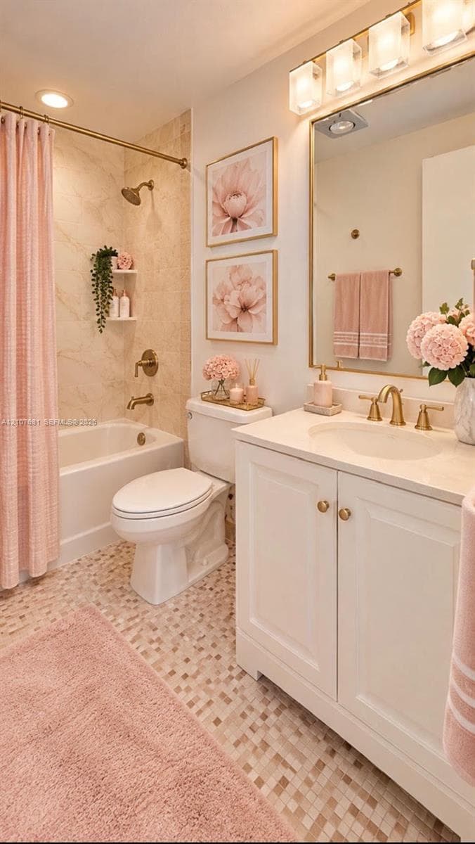 Bathroom featuring a white vanity cabinet with a stone countertop, an oval under-mount sink with brass-finish fixtures, a built-in bathtub with shower surround, a tiled floor, and a framed mirror with integrated lighting