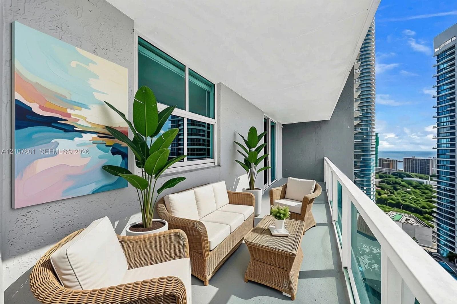 VIRTUALLY STAGED - Covered balcony featuring painted concrete flooring, textured walls, and a white metal railing
