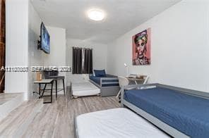 Wood-finish flooring and flush-mount ceiling lighting