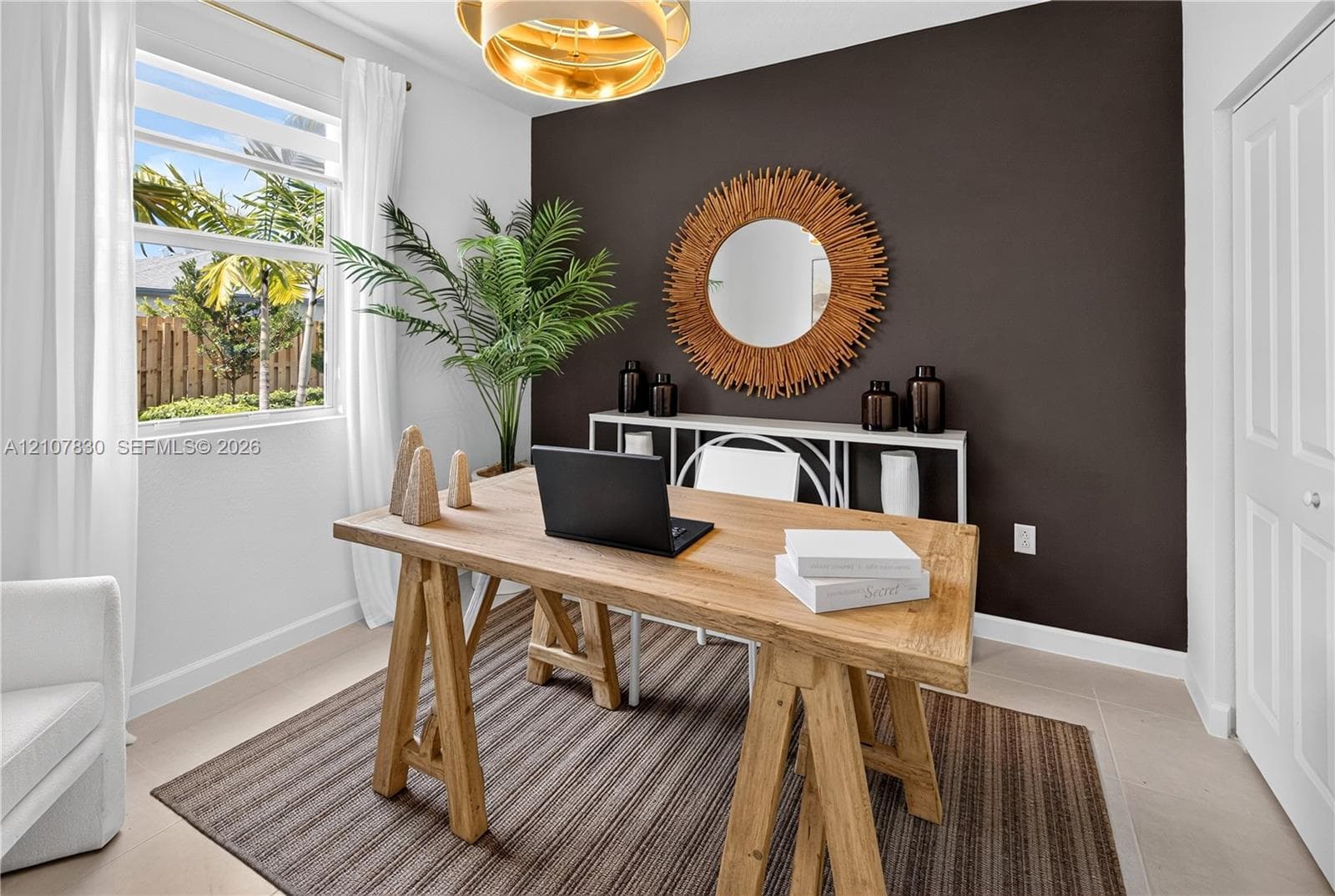 This bedroom boasts a versatile location on the main level, perfect for a guest room, home office and more.