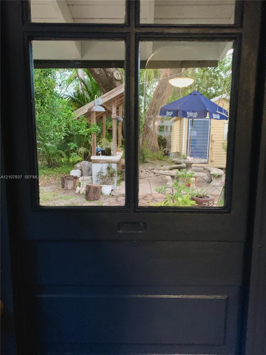 View to backyard area from kitchen door