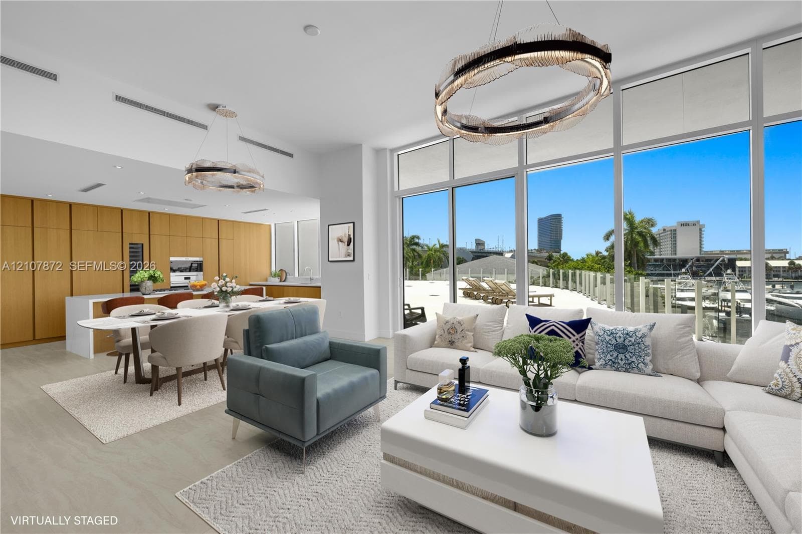 Floor-to-ceiling glass windows, floor-to-ceiling wood-finish cabinetry, built-in kitchen appliances, and geometric modern light fixtures