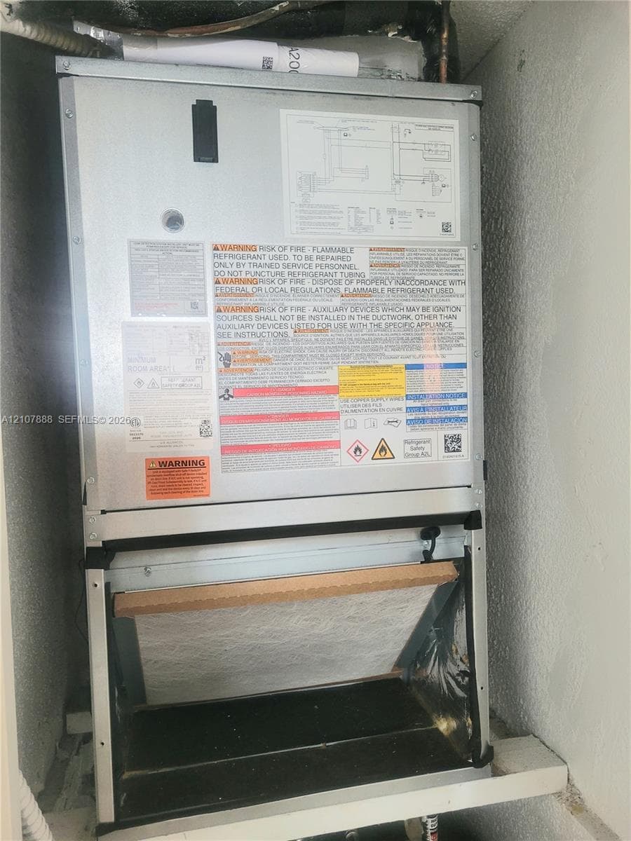 Metal-encased HVAC air handler unit with internal filtration system