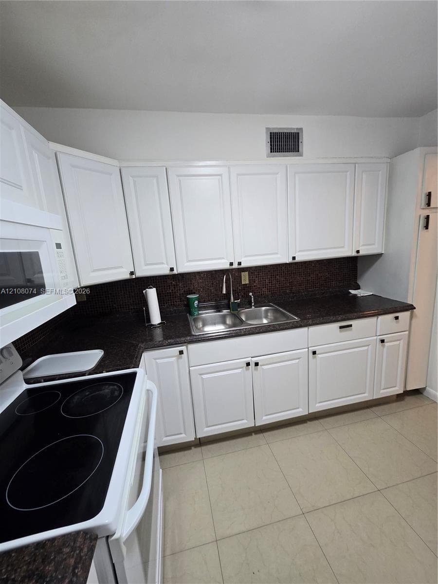 CARIBBEAN BREEZE CONDO · #202 in Sunny Isles Beach - Photo 9