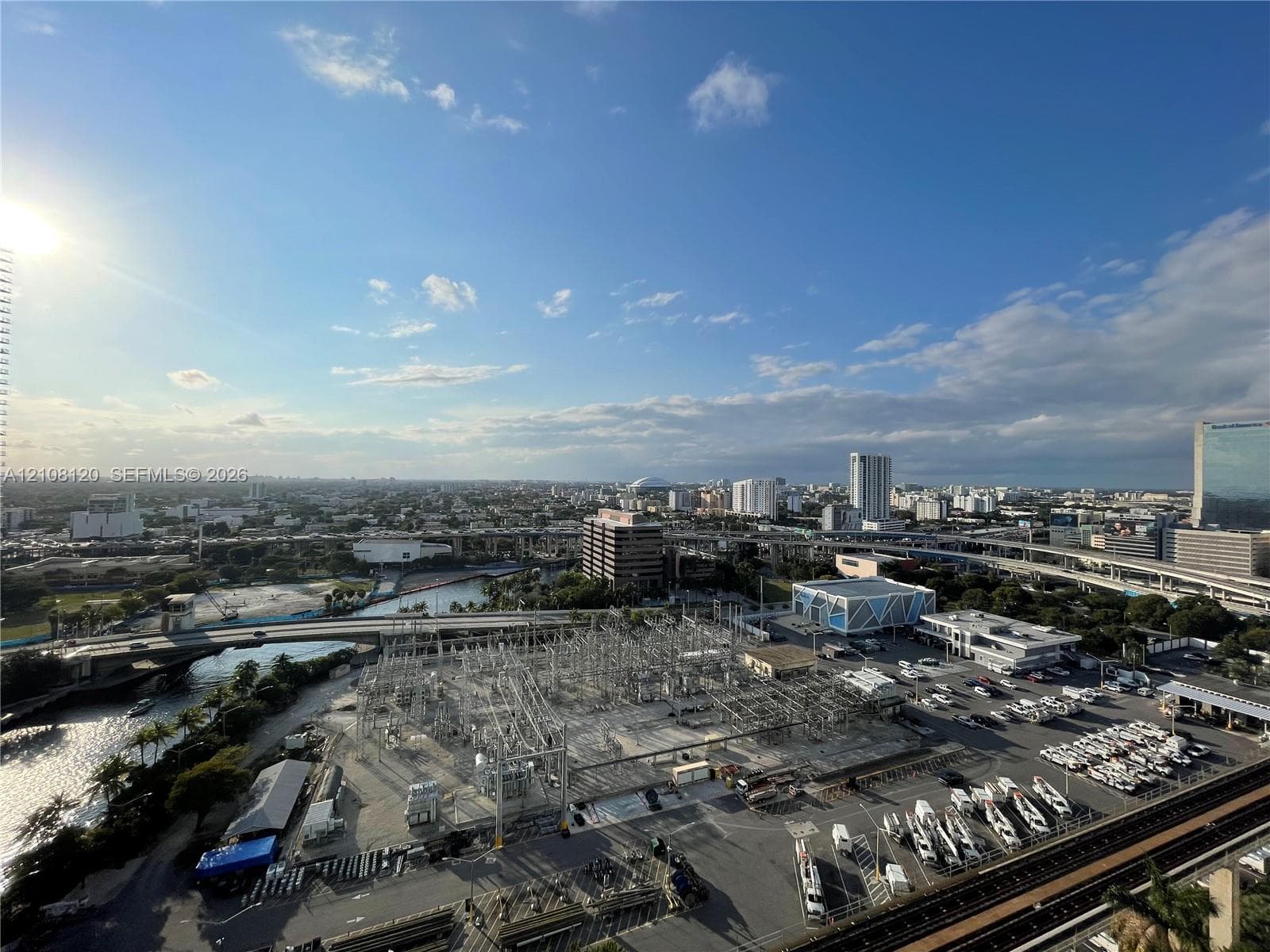 High-elevation vantage point featuring panoramic cityscape and water horizons