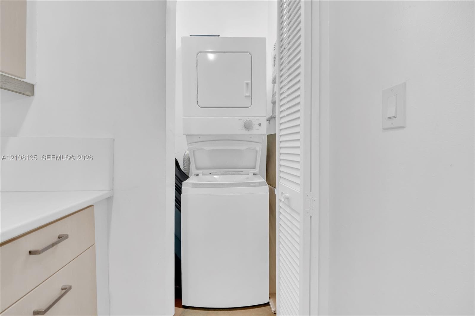 Stacked laundry in unit