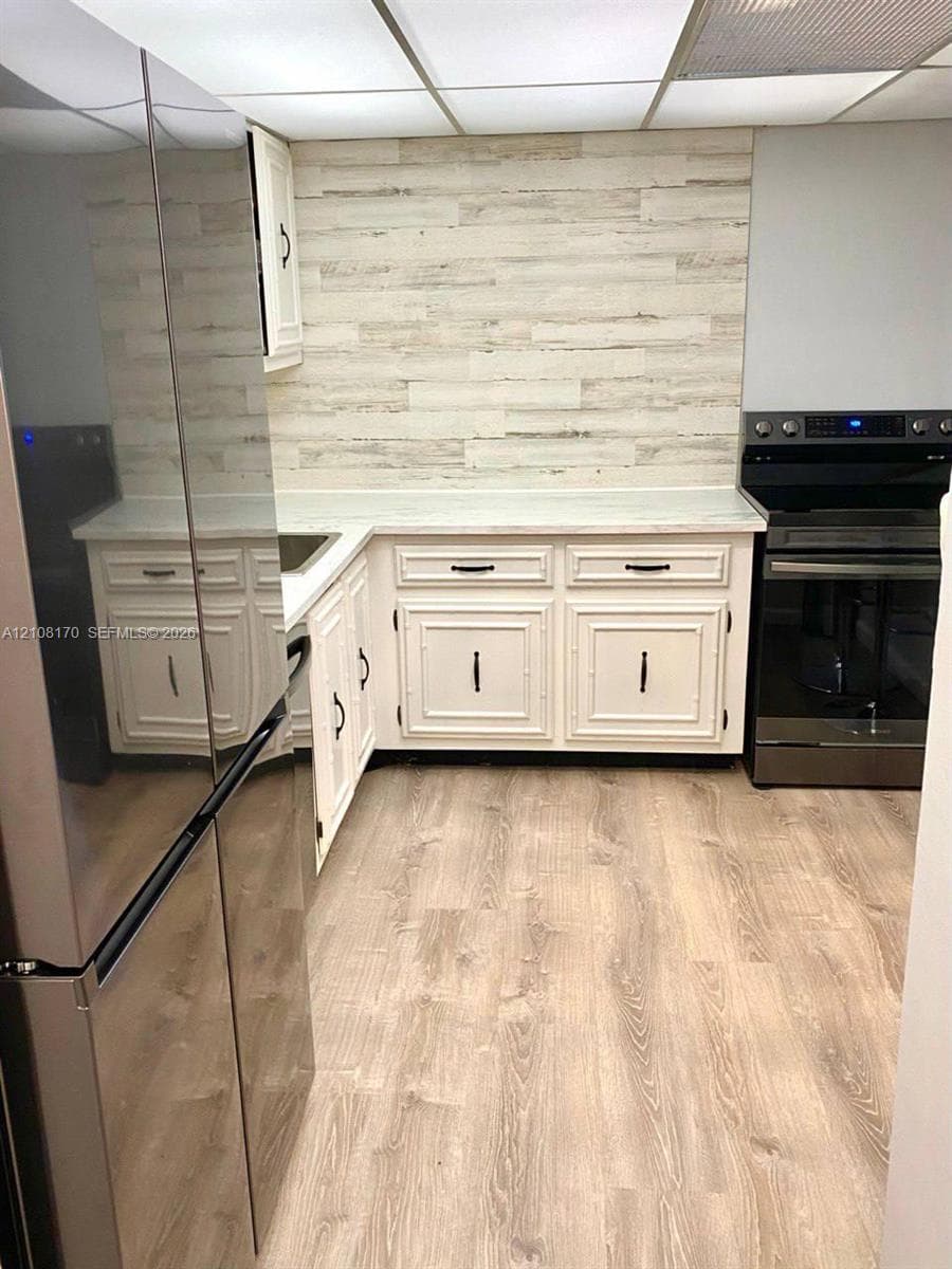 Updated Kitchen Flooring and Backdrop