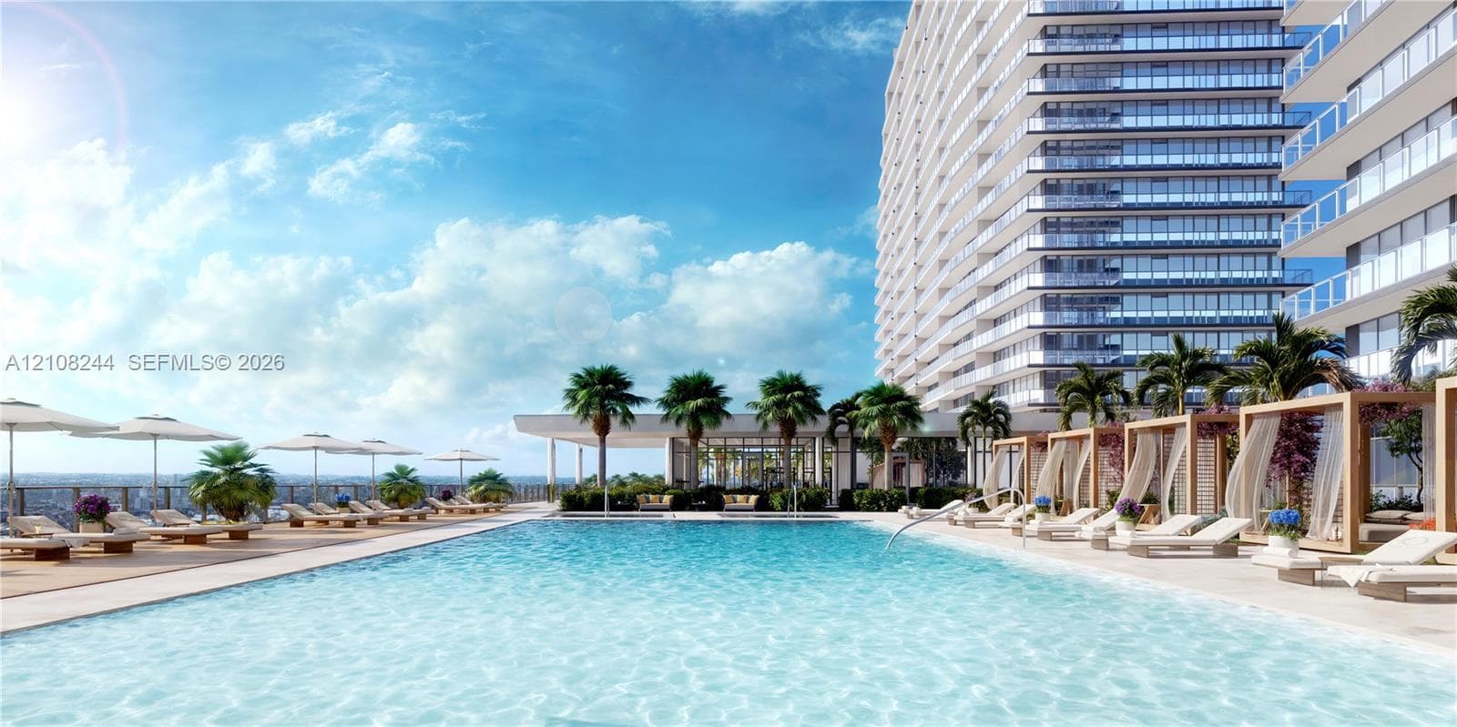 Resort-style pool deck featuring a swimming pool, sun terrace, and structured cabanas