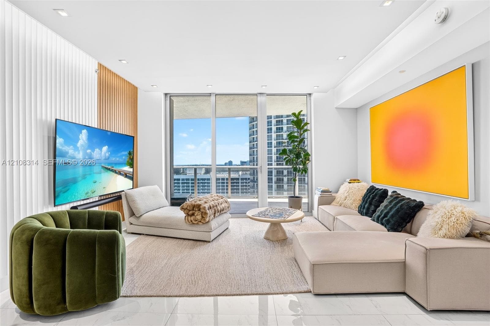 Living area featuring floor-to-ceiling glass windows, recessed lighting, white tile flooring, and a decorative wood-slat accent wall