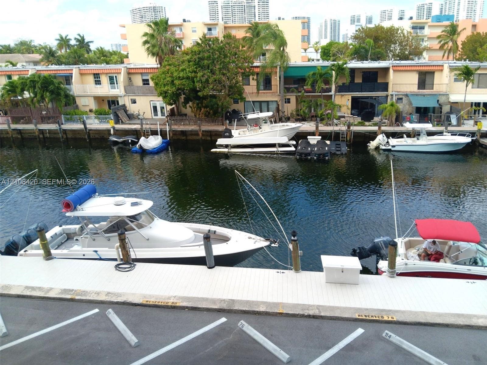 Waterfront property featuring a private concrete dock, deep-water access, and designated mooring space