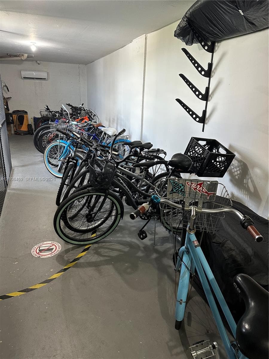 Enclosed storage space featuring a wall-mounted rack system and a dedicated climate-control unit