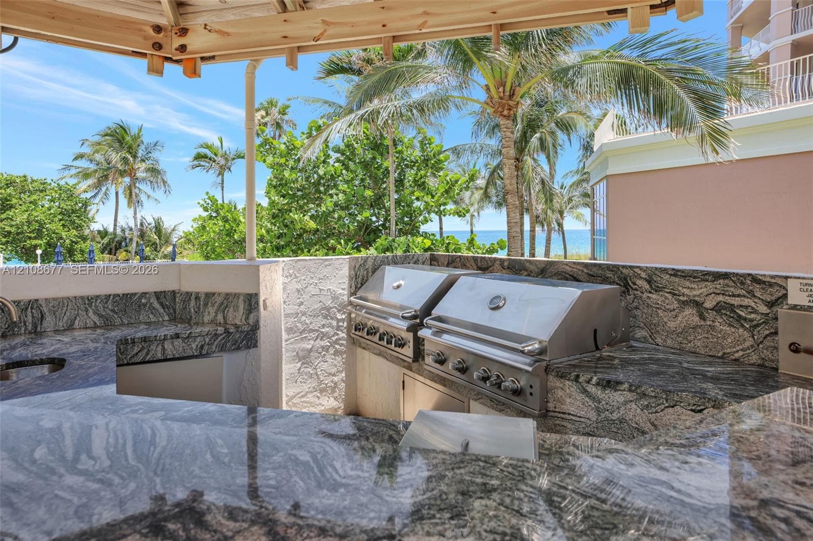 Swimming pool w/ tropical landscaping