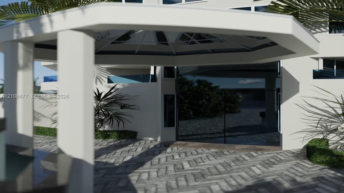 Fenced tennis court with a hard-surface finish, surrounded by mature palm trees and manicured landscaping