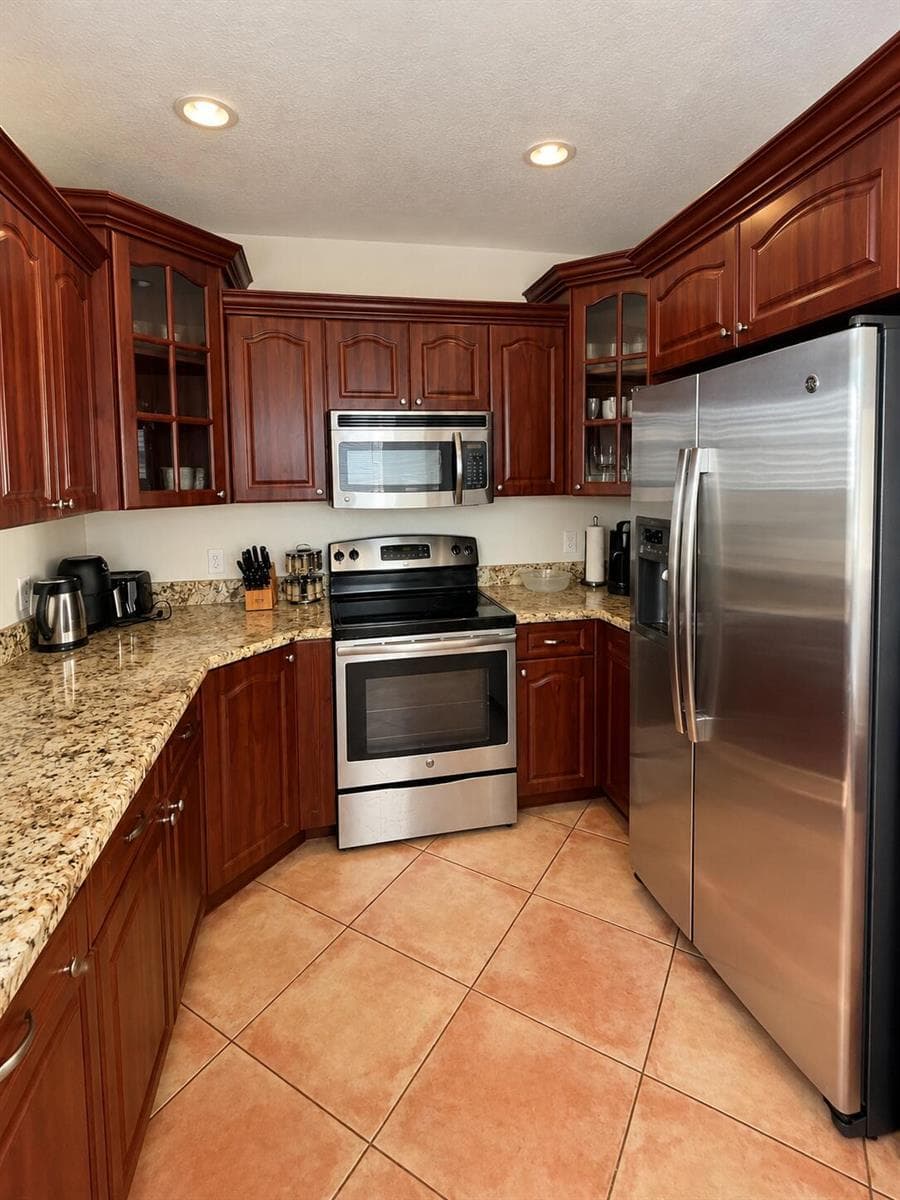 Warm Cherrywood U-Shaped Kitchen