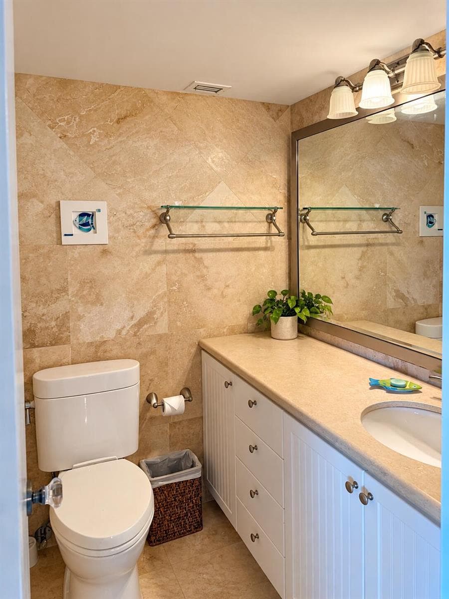 Warm Neutral Bathroom with Coastal Accen