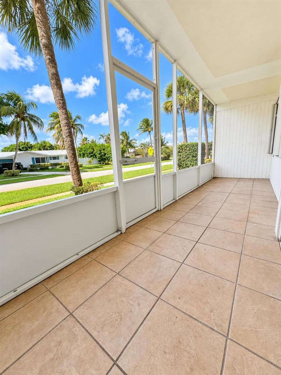Screened Lanai with Palm Views