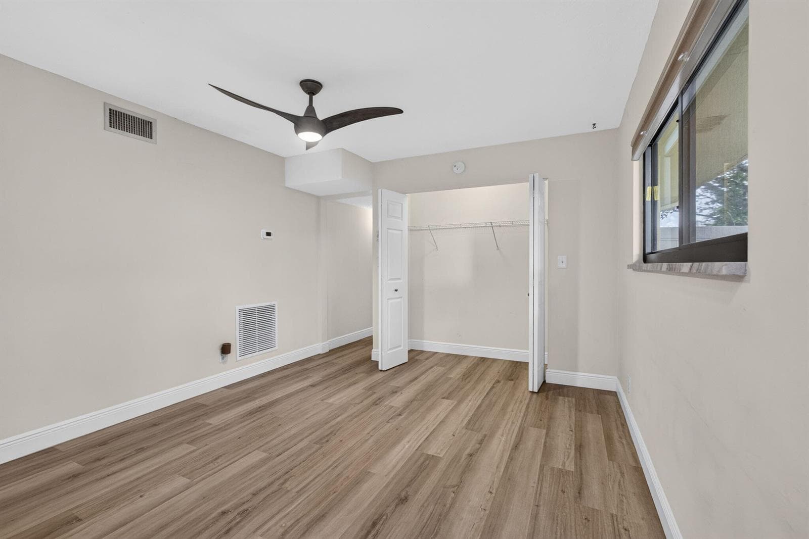 Living Room with Storage Closet