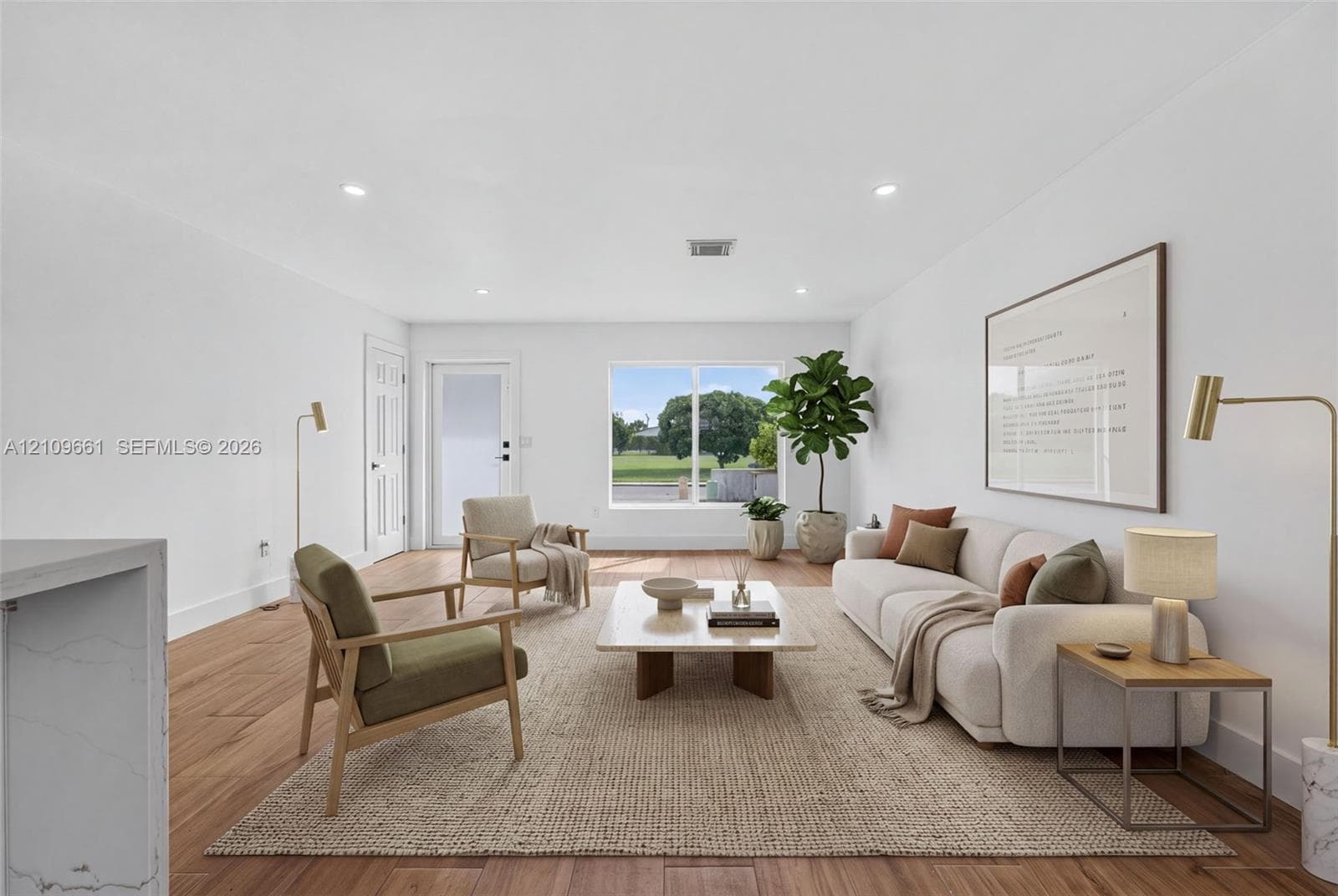 (AI-staged) Living space featuring wood-finish flooring, recessed lighting, and a large picture window