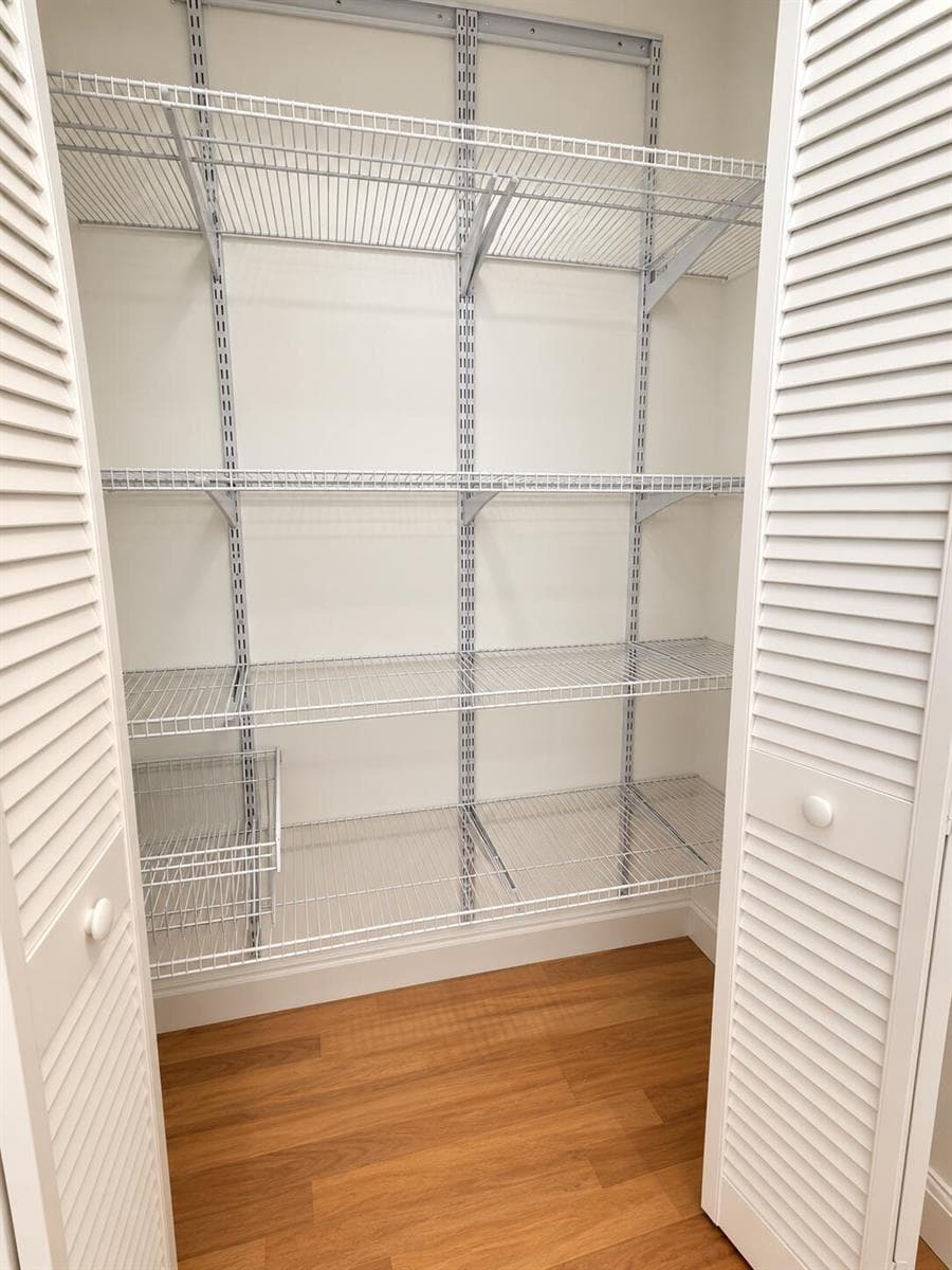 Empty White Wire-Shelved Closet
