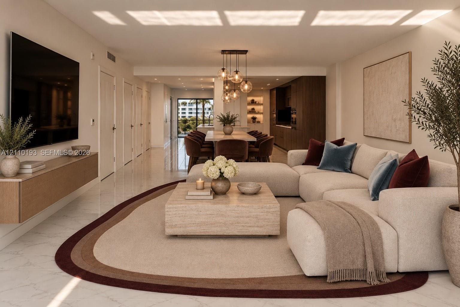 Open-concept living space featuring polished stone flooring, a wall-mounted wood-finish media console, custom built-in cabinetry, and multi-pendant globe lighting - virtual staging