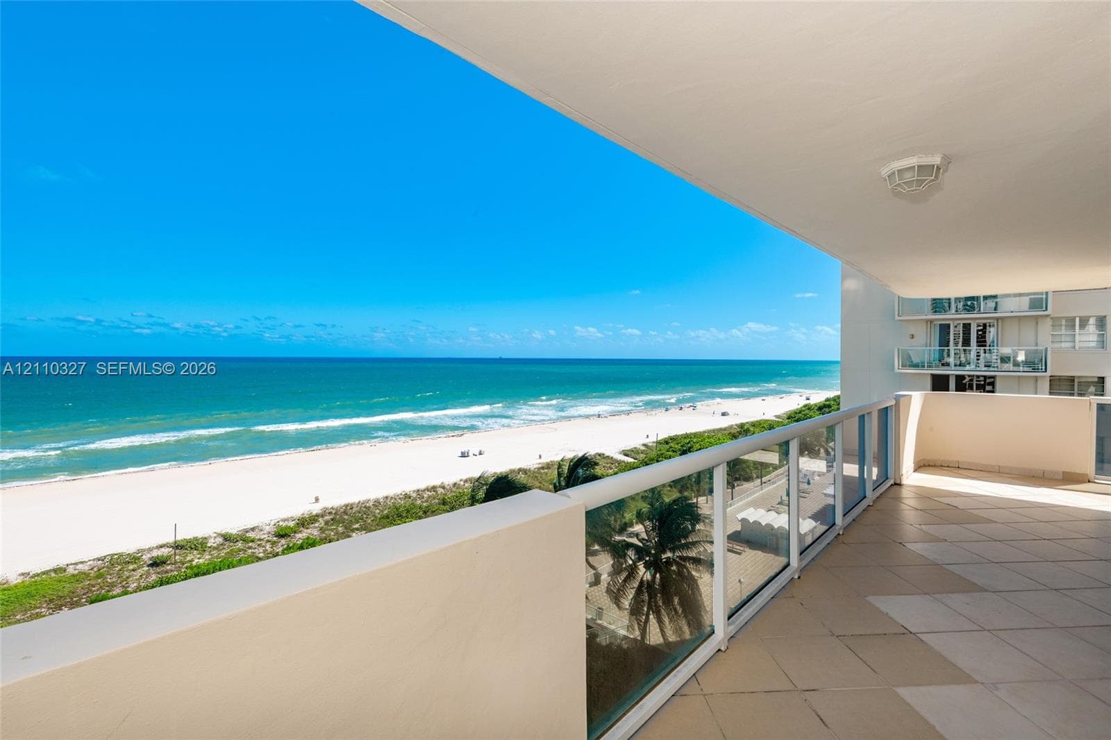 Spacious balcony from living room with direct and unobstructed ocean views