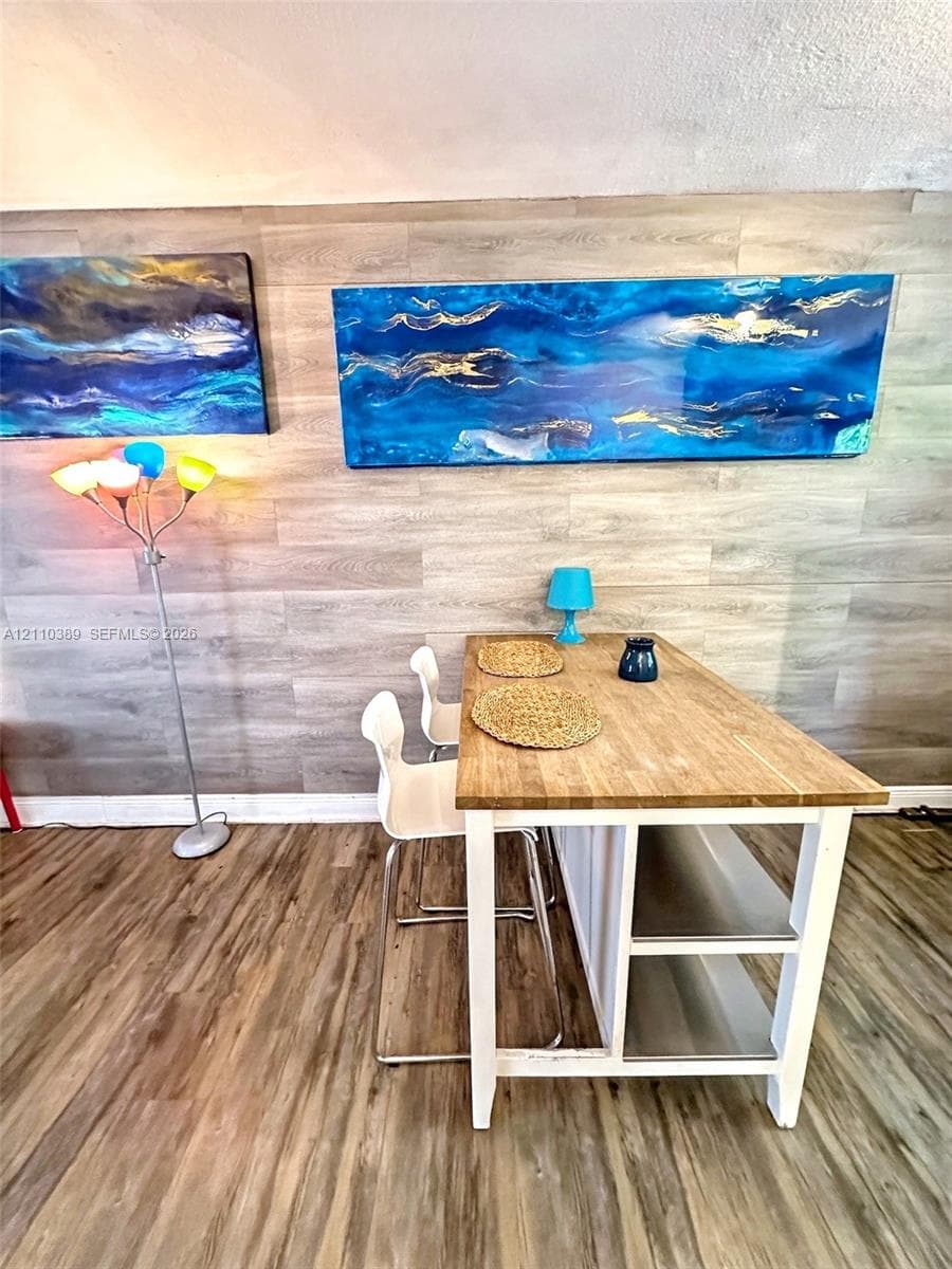 Wood-finish flooring and horizontal plank wall accent