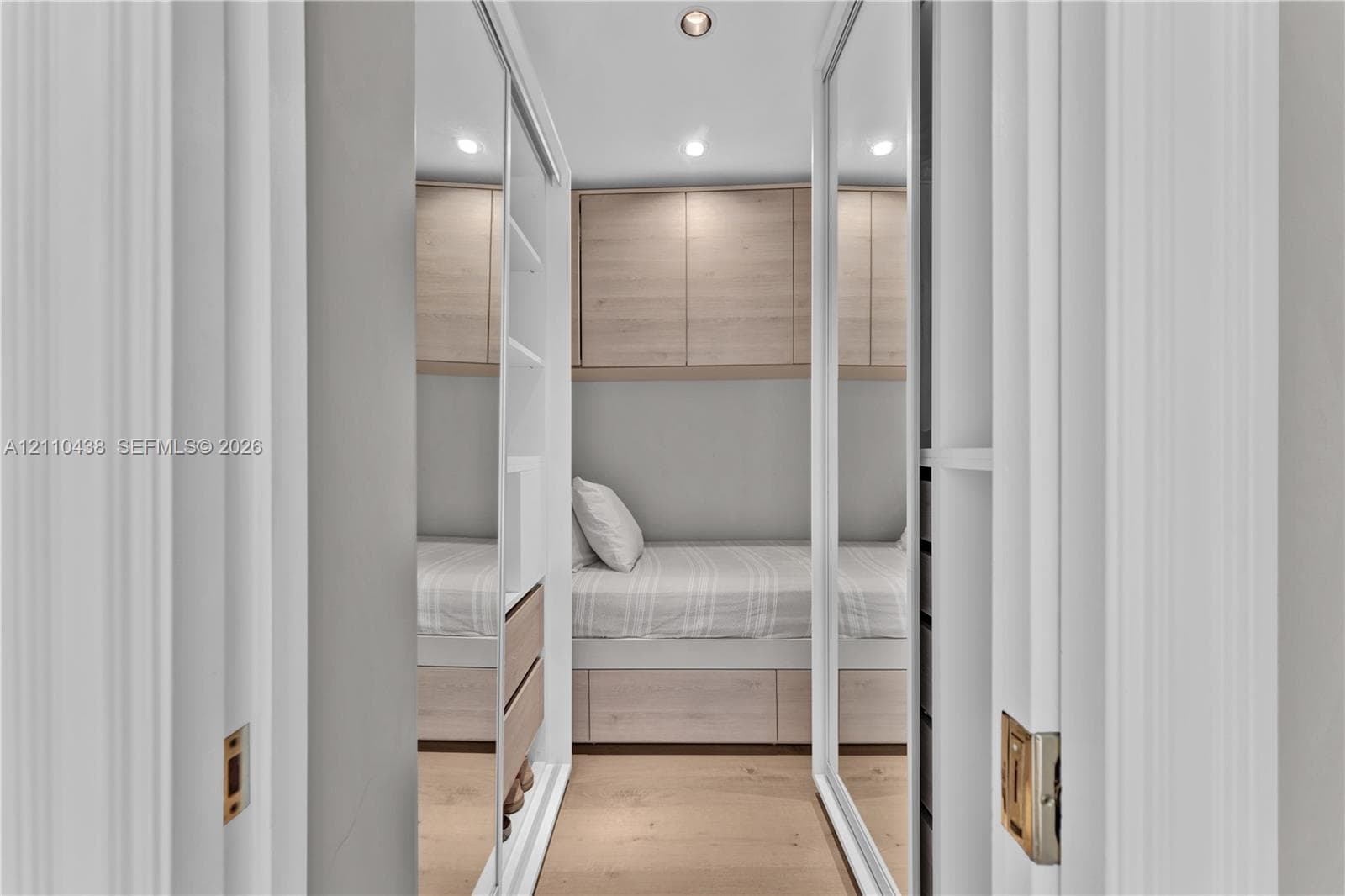 2nd bedroom closet with small bed