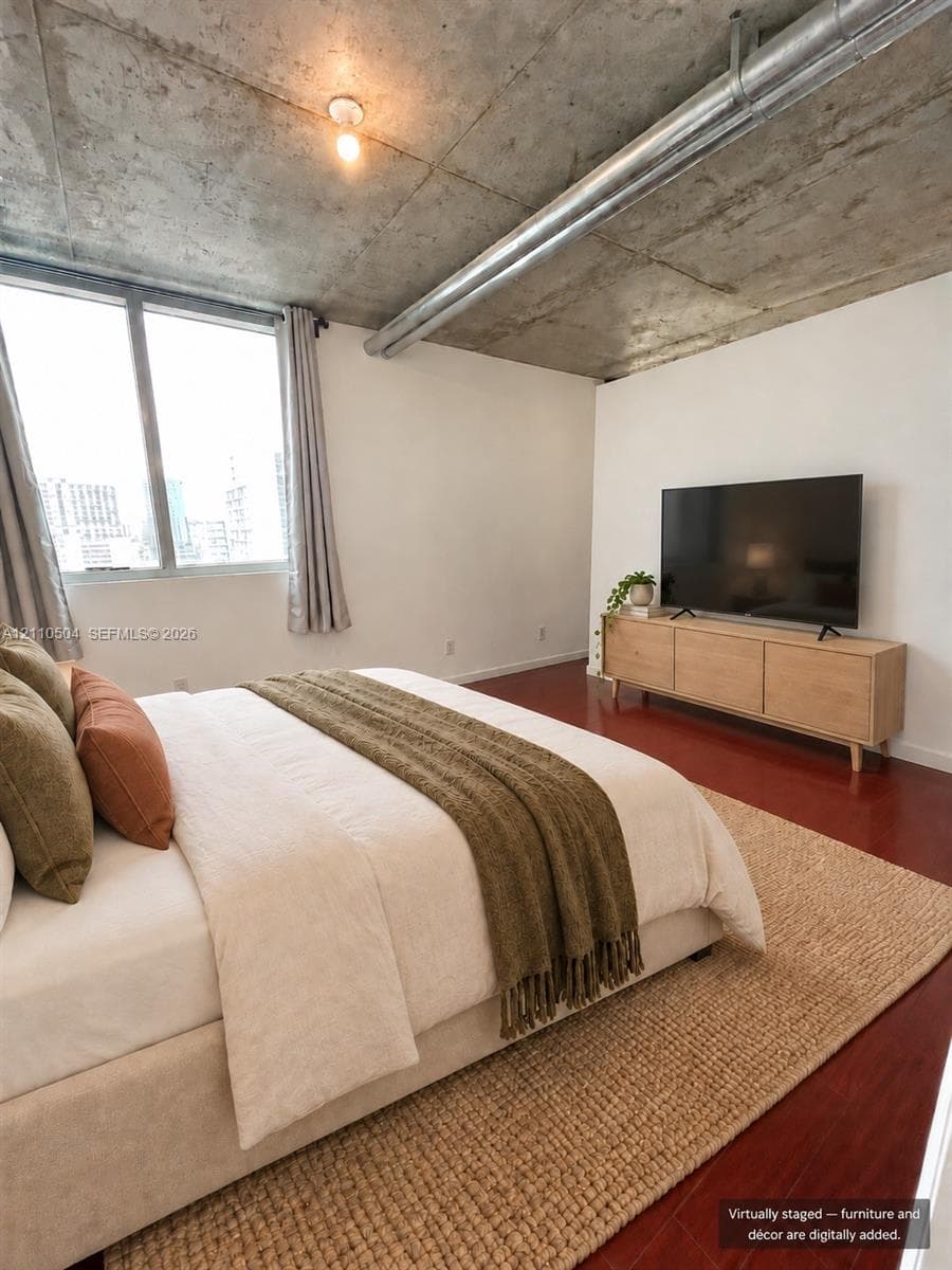 VIRTUAL STAGING -Exposed concrete ceiling, dark wood-finish flooring, floor-to-ceiling windows, and double-door closet