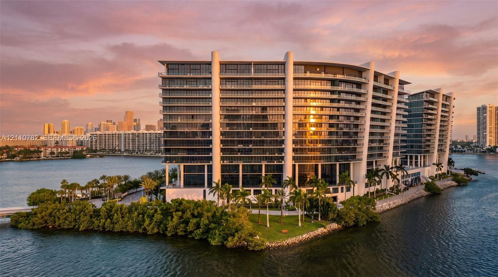 Modern high-rise architecture featuring expansive glass curtain walls, wrap-around balconies, deep-water access, and integrated ground-level swimming pools