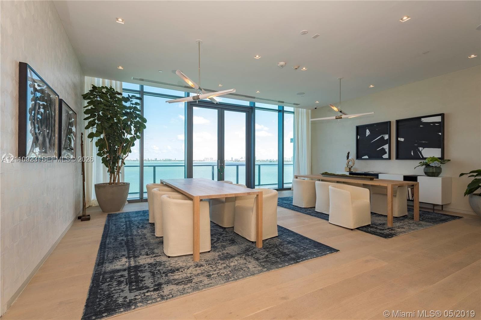 Amenities level designed for events, parties or everyday use with WIFI all around. Floor-to-ceiling windows, wood-finish flooring, recessed lighting, and modern light fixtures