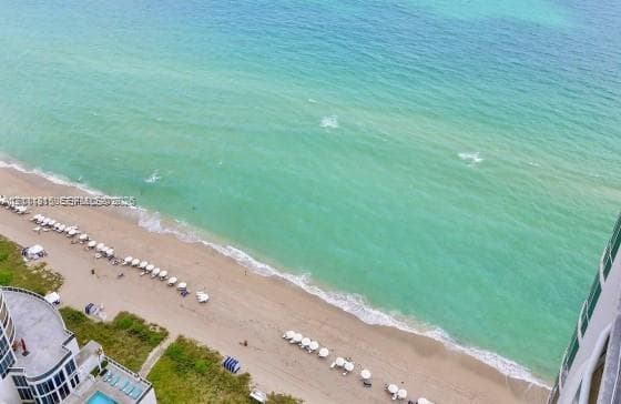 Direct oceanfront exposure featuring expansive Atlantic Ocean scenery and immediate sand beach access