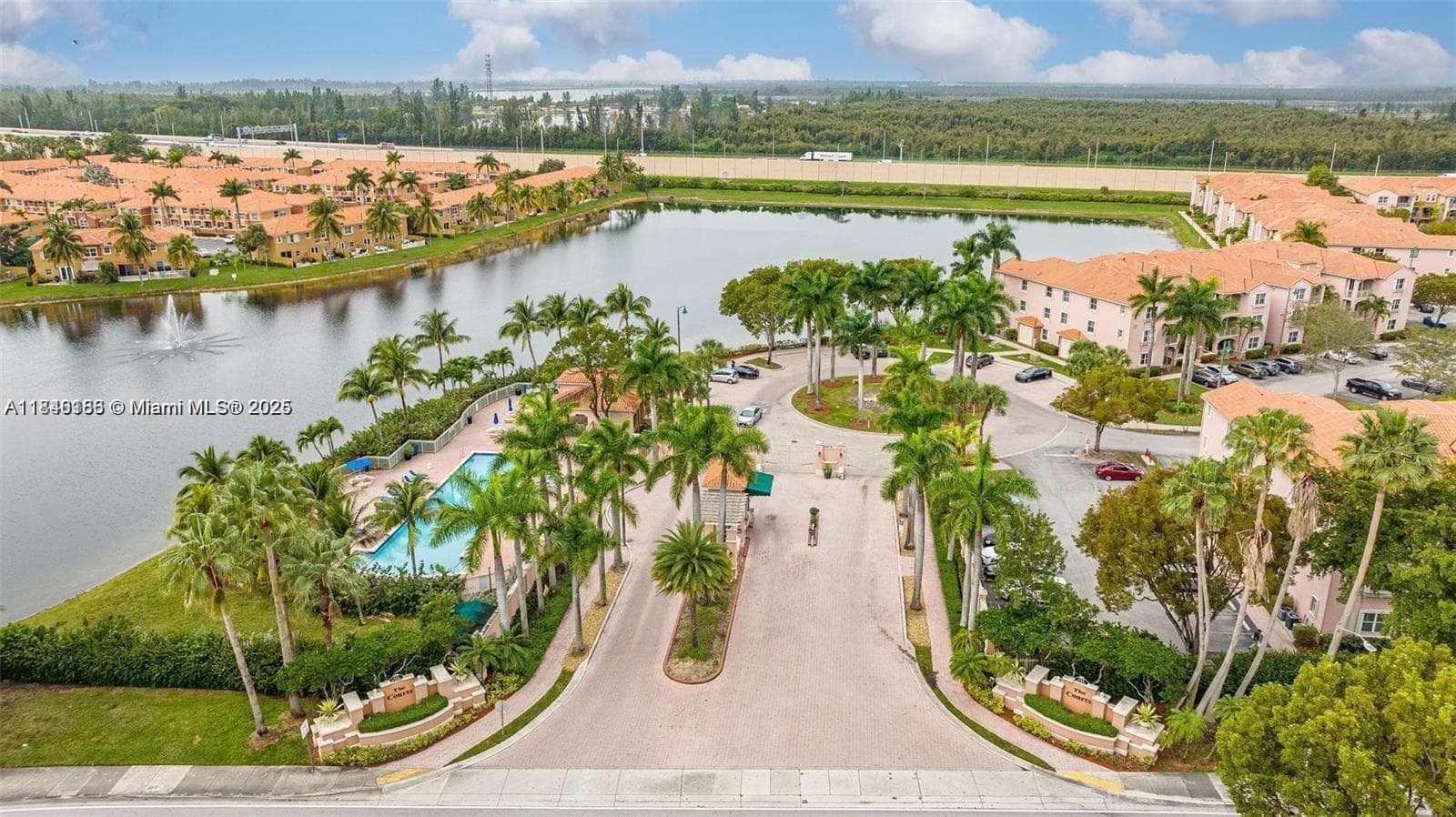 THE COURTS AT DORAL ISLES · #1424 in Doral - Photo 1