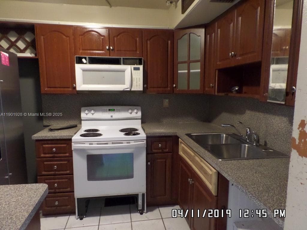 SUNSET HILLS I CONDOMINIU · #101 in Lauderdale Lakes - Photo 1