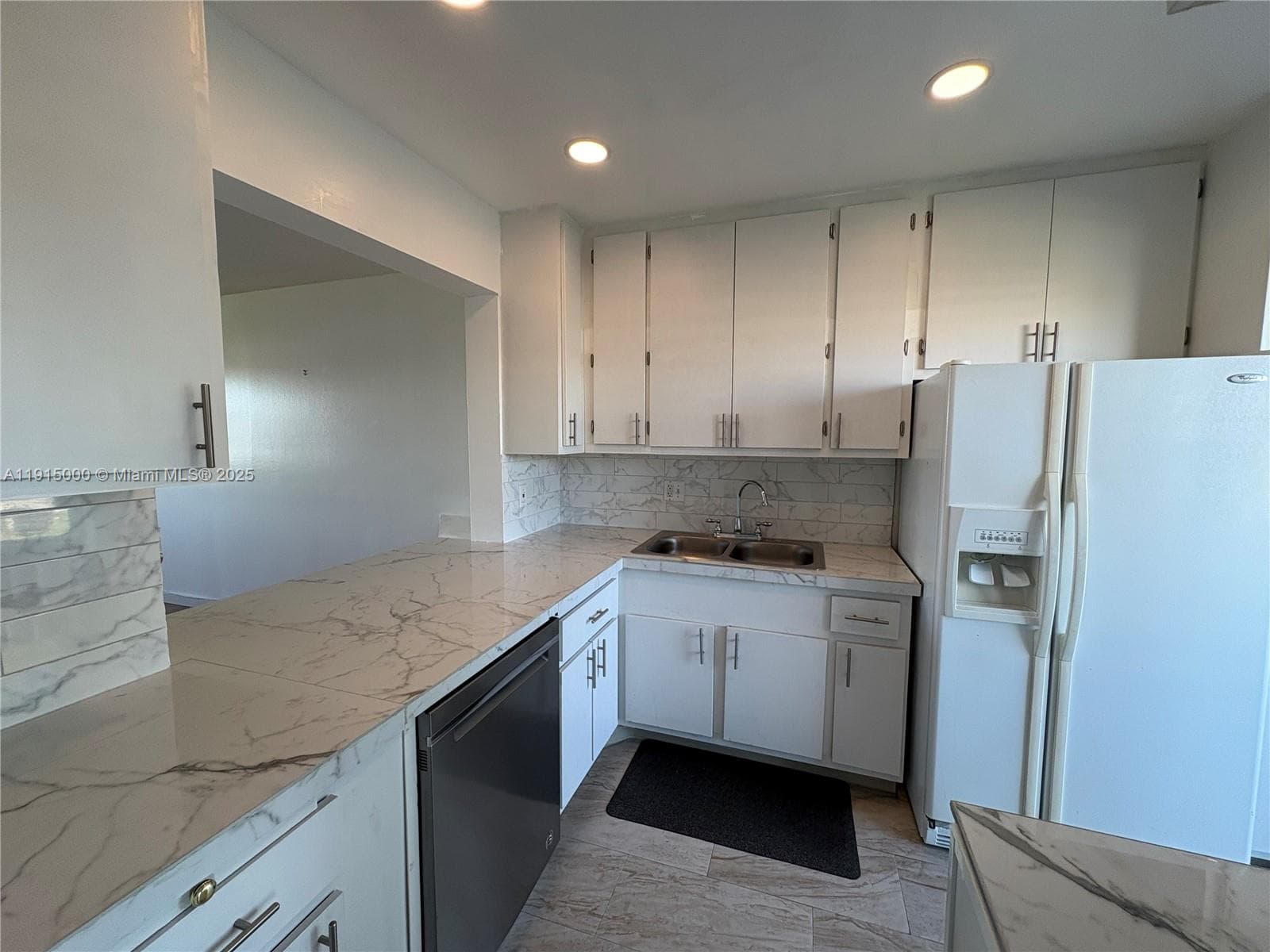 Renovated kitchen with dishwasher machine
