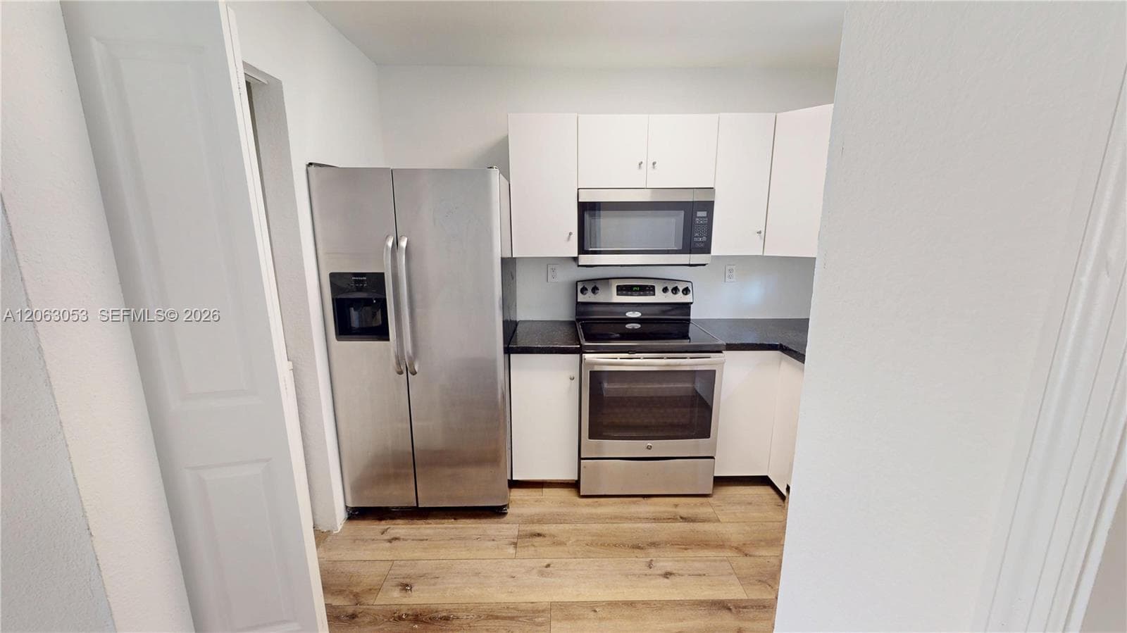 2084 NE 167th St # 102 #2-102 photo 1