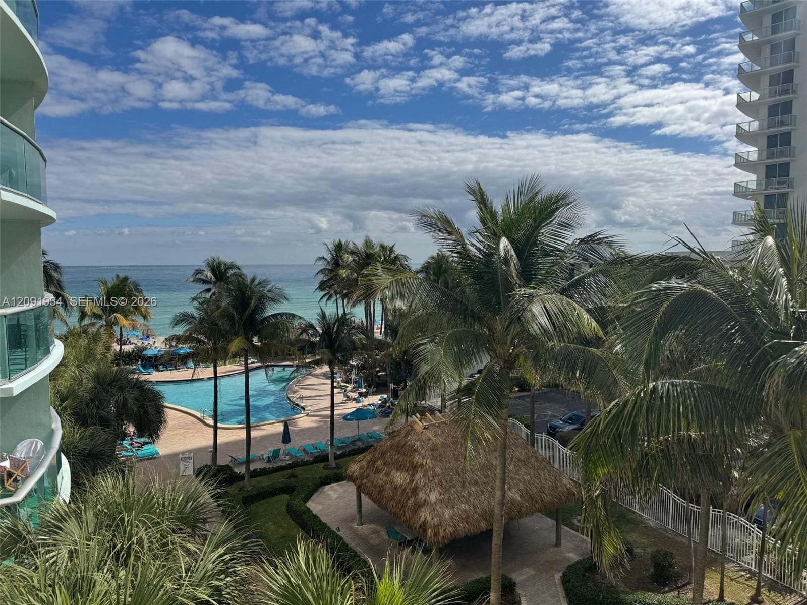 Actual view from the unit, facing SE, ocean & pool.