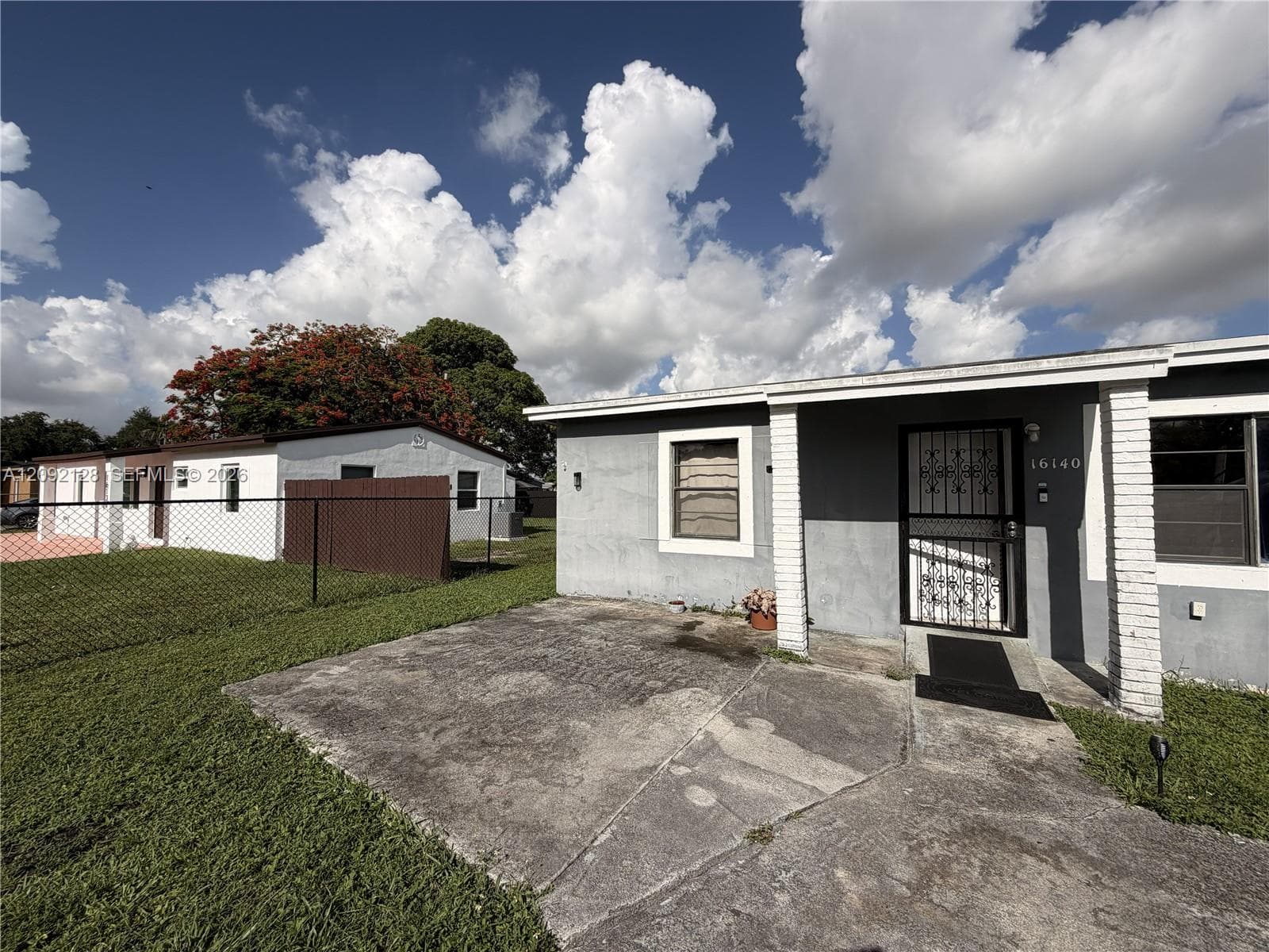 16140 NW 28th Ct photo 1