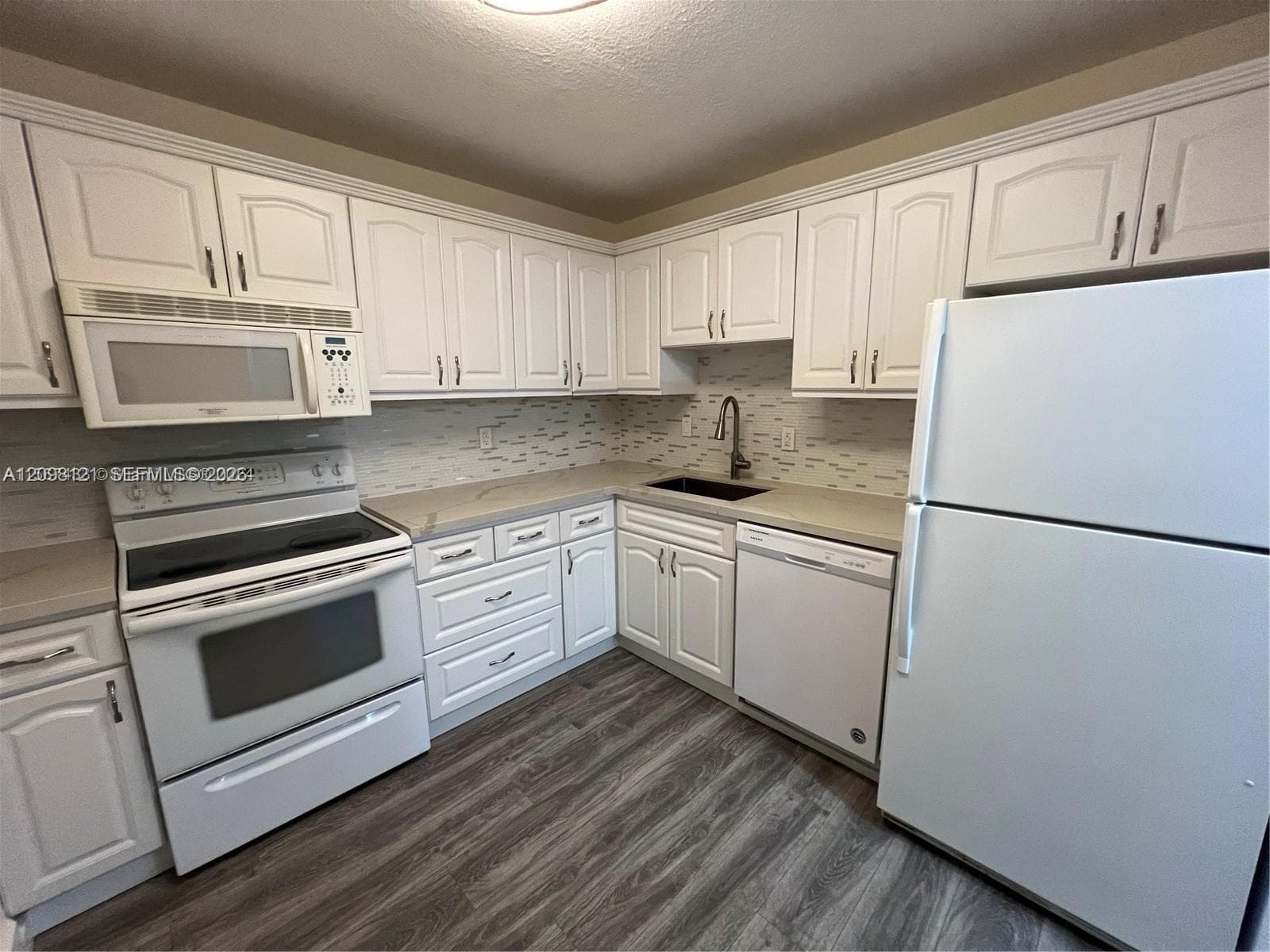 VILLAGE OF KINGS CREEK CO · #306 in Miami - Photo 1
