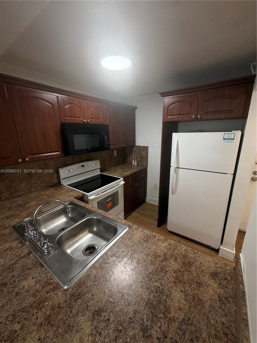 TALL TREES CONDO · #412 in North Miami Beach - Photo 1