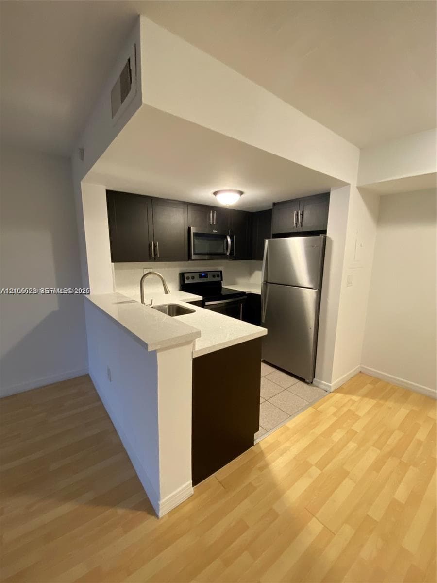 CORAL POINTE TOWNHOMES CO · #11-205 in Miami - Photo 1