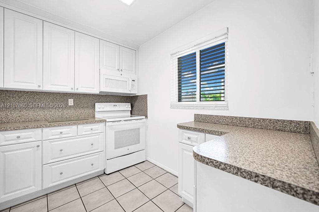 VILLAGE OF KINGS CREEK CO · #G-407 in Miami - Photo 1